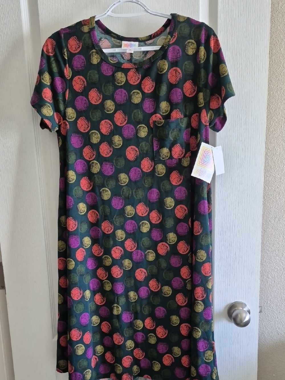 LuLaRoe black dress with multicolor polka dots (purple, orange, green, yellow)
